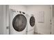 Modern laundry room equipped with updated washer and dryer at 3219 Timorasso Ave, Henderson, NV 89044