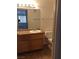 Bathroom featuring tile floors, a vanity with a sink, and a toilet at 3318 N Decatur Blvd # 2077, Las Vegas, NV 89130