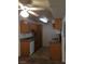 Functional kitchen with a dishwasher, wood cabinets, and ample counter space at 3318 N Decatur Blvd # 2077, Las Vegas, NV 89130