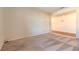 Spacious living room featuring plush carpet and light-colored walls at 3665 E Garfield Dr, Pahrump, NV 89061
