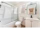 Modern bathroom with a shower-tub combo, stylish vanity, and sleek fixtures at 3915 Delling Ct, Las Vegas, NV 89104