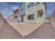 Modern home featuring a low-maintenance backyard with gravel, enclosed by sturdy walls for privacy at 4333 Tabor Peak Ave, Las Vegas, NV 89141
