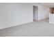 Hallway featuring neutral carpet, white walls, and multiple doorways leading to other rooms at 4333 Tabor Peak Ave, Las Vegas, NV 89141