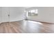 Bright living room with modern wood flooring and white walls, spacious and clean at 4333 Tabor Peak Ave, Las Vegas, NV 89141