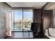 Contemporary bathroom with modern fixtures and floor-to-ceiling window showcasing city views at 4381 W Flamingo Rd # 3002, Las Vegas, NV 89103