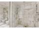Modern bathroom with a glass shower enclosure and tiled walls at 4381 W Flamingo Rd # 3002, Las Vegas, NV 89103
