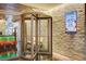 Elegant hotel entrance with revolving doors and modern design elements at 4381 W Flamingo Rd # 3002, Las Vegas, NV 89103