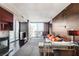 Modern living room with fireplace, city views, floor-to-ceiling windows, and stylish furniture at 4381 W Flamingo Rd # 3002, Las Vegas, NV 89103