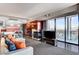 Open-concept condo featuring expansive city views, fireplace, and modern kitchen at 4381 W Flamingo Rd # 3002, Las Vegas, NV 89103