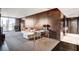 Elegant living room with hardwood floors, chic decor, city view, and access to hall at 4381 W Flamingo Rd # 3002, Las Vegas, NV 89103