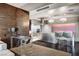 Open floor plan living space with sleek stainless steel kitchen and stylish furnishings at 4381 W Flamingo Rd # 3002, Las Vegas, NV 89103