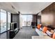 Contemporary living room with stunning city views through expansive windows, great for entertaining at 4381 W Flamingo Rd # 3002, Las Vegas, NV 89103