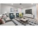 Bright living room featuring stylish furniture, modern decor, and plenty of natural light at 4432 Ash Ave, Las Vegas, NV 89110