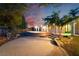 Expansive backyard features a large patio, mature trees and landscaping with brick accents at 4530 W Shelbourne Ave, Las Vegas, NV 89139