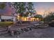 Backyard features a large patio for entertaining, mature trees, and desert landscaping at 4530 W Shelbourne Ave, Las Vegas, NV 89139