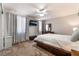 This bedroom features a queen-sized bed, dresser, and television at 4530 W Shelbourne Ave, Las Vegas, NV 89139