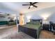 Bedroom featuring a large closet with mirrored doors, plush carpet, and neutral walls at 4530 W Shelbourne Ave, Las Vegas, NV 89139