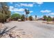 Expansive lot with desert landscaping and plenty of space for parking and storing vehicles at 4530 W Shelbourne Ave, Las Vegas, NV 89139