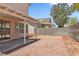 Backyard with a covered patio, gravel landscaping, and block wall at 5228 Shasta Lake Way, Las Vegas, NV 89118
