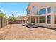 Backyard featuring gravel landscaping, block wall, and a covered patio at 5228 Shasta Lake Way, Las Vegas, NV 89118