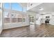 Open concept living space with hardwood floors and lots of windows with natural light at 5228 Shasta Lake Way, Las Vegas, NV 89118