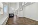 Open-concept living area with hardwood floors, fireplace, and ample natural light at 5228 Shasta Lake Way, Las Vegas, NV 89118