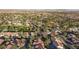 An expansive aerial view of the neighborhood's diverse homes and lush greenery at 5601 Cavalier Cir, Las Vegas, NV 89130