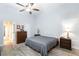 Comfortable bedroom featuring wood-look flooring and a ceiling fan at 5601 Cavalier Cir, Las Vegas, NV 89130