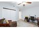Spacious bedroom featuring wood-look flooring, closet and ceiling fan at 5601 Cavalier Cir, Las Vegas, NV 89130