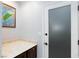 Laundry room with front load washer and dryer and cabinet storage at 5601 Cavalier Cir, Las Vegas, NV 89130