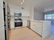 Bright kitchen with stainless steel appliances, white cabinets, and plenty of countertop space at 5710 E Tropicana Ave # 1018, Las Vegas, NV 89122