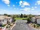 Elegant gated community entrance surrounded by lush landscaping, offering privacy and security at 7241 Indian Creek Ln # 203, Las Vegas, NV 89149