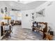 Foyer entry with views to office, rustic décor, and wood-look flooring at 7241 Indian Creek Ln # 203, Las Vegas, NV 89149