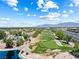 Picturesque golf course with lush green fairways and a tranquil lake, perfect for golfers and nature lovers at 7241 Indian Creek Ln # 203, Las Vegas, NV 89149