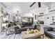 Comfortable living room with vaulted ceilings flows into the kitchen and features stylish decor and ample seating at 7241 Indian Creek Ln # 203, Las Vegas, NV 89149