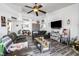Comfortable living room with vaulted ceiling, media center, and view of the entry at 7241 Indian Creek Ln # 203, Las Vegas, NV 89149
