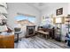 Cozy office featuring a stone fireplace and a window with neighborhood views at 7241 Indian Creek Ln # 203, Las Vegas, NV 89149