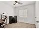 Bright bedroom with a ceiling fan and plenty of space for a desk and gaming setup at 7437 Treasure Chest St, Las Vegas, NV 89139