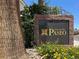 Attractive stone sign for the American West Paseo community featuring lush landscaping at 7437 Treasure Chest St, Las Vegas, NV 89139