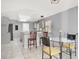 Open-concept dining and kitchen with breakfast bar and stainless steel appliances, perfect for Gathering gatherings at 7437 Treasure Chest St, Las Vegas, NV 89139