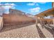 Paver patio with covered seating area and ceiling fans provides relaxing outdoor space at 7707 W Diablo Dr, Las Vegas, NV 89113