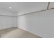 Spacious walk-in closet featuring neutral carpeting and built in organizers at 7707 W Diablo Dr, Las Vegas, NV 89113