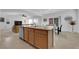Open floor plan from kitchen view to living room and dining room at 7707 W Diablo Dr, Las Vegas, NV 89113