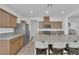 Kitchen featuring a stainless steel refrigerator and granite countertops with barstool seating at 7707 W Diablo Dr, Las Vegas, NV 89113