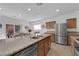 Kitchen featuring a stainless steel refrigerator and view into the dining room at 7707 W Diablo Dr, Las Vegas, NV 89113