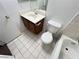 Neat bathroom with tiled floors, vanity, and combined tub and shower at 7948 Calico Vista Blvd # 101, Las Vegas, NV 89128