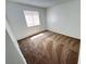 Bedroom featuring carpet floors and a window, offering a simple and functional space at 7948 Calico Vista Blvd # 101, Las Vegas, NV 89128
