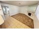 Comfortable living room with carpeted area and stone fireplace feature at 7948 Calico Vista Blvd # 101, Las Vegas, NV 89128