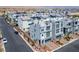 Aerial view of modern homes with rooftop terraces and desert landscaping at 8175 Caldera Creek St, Las Vegas, NV 89113