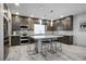 Kitchen with an island and stainless steel appliances at 8175 Caldera Creek St, Las Vegas, NV 89113